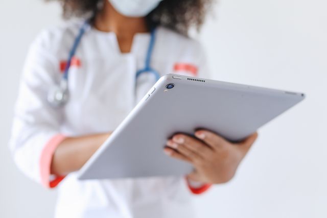 Healthcare professional using ACU-Insight analytics and digital intake workflows to support DME revenue cycle management.