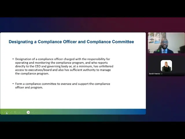 Presentation slide titled "Designating a Compliance Officer and Compliance Committee" alongside two video participants in a virtual meeting.